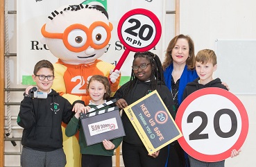 Councillor MacInnes with school pupils and The Reducer mascot