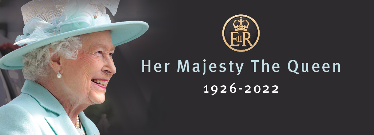 HRH The Queen smiling, with a black background and the words Her Majesty The Queen 1926-2022