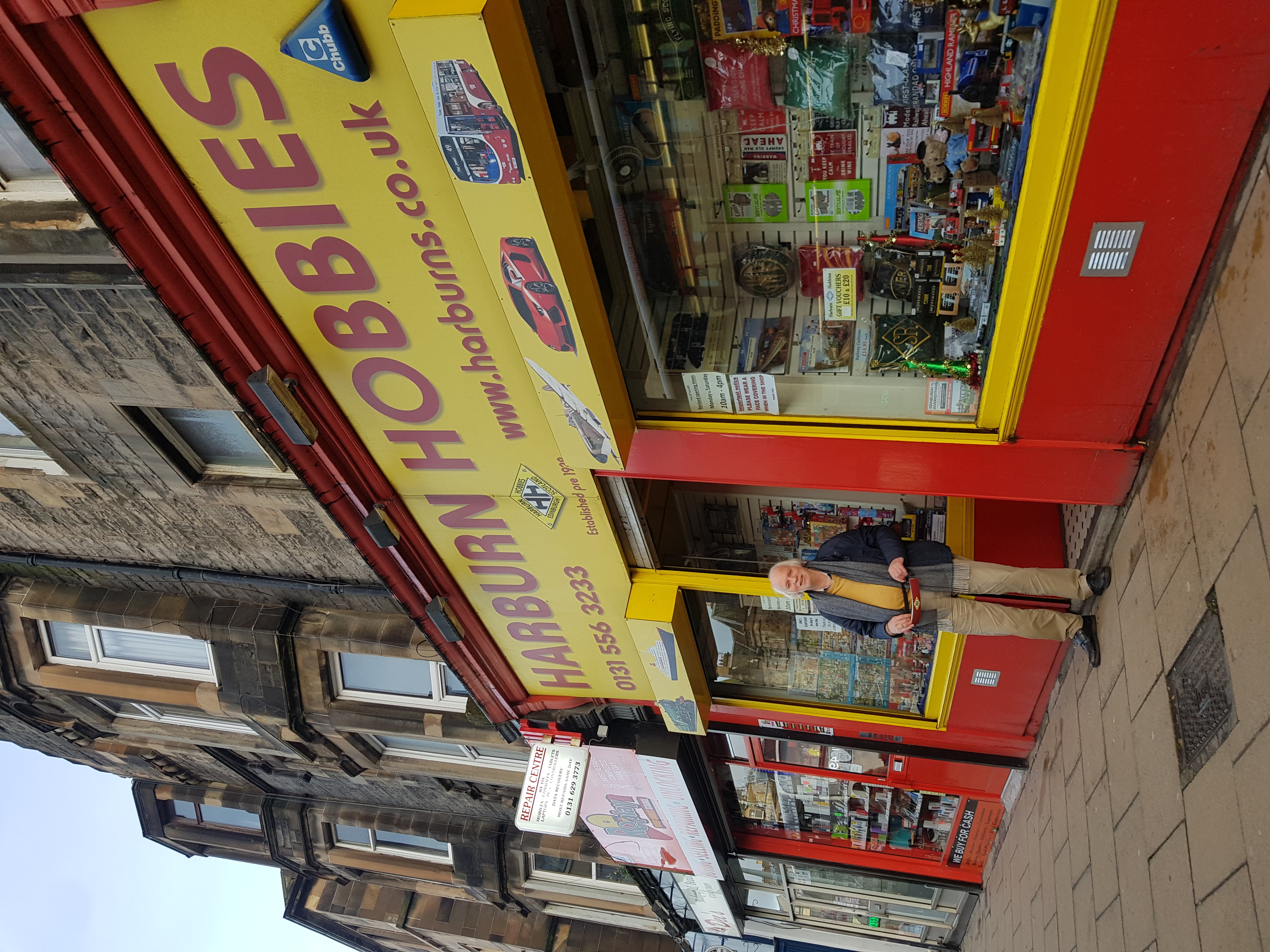 Picture of the owner outside of Harburn Hobbies on Elm Row.