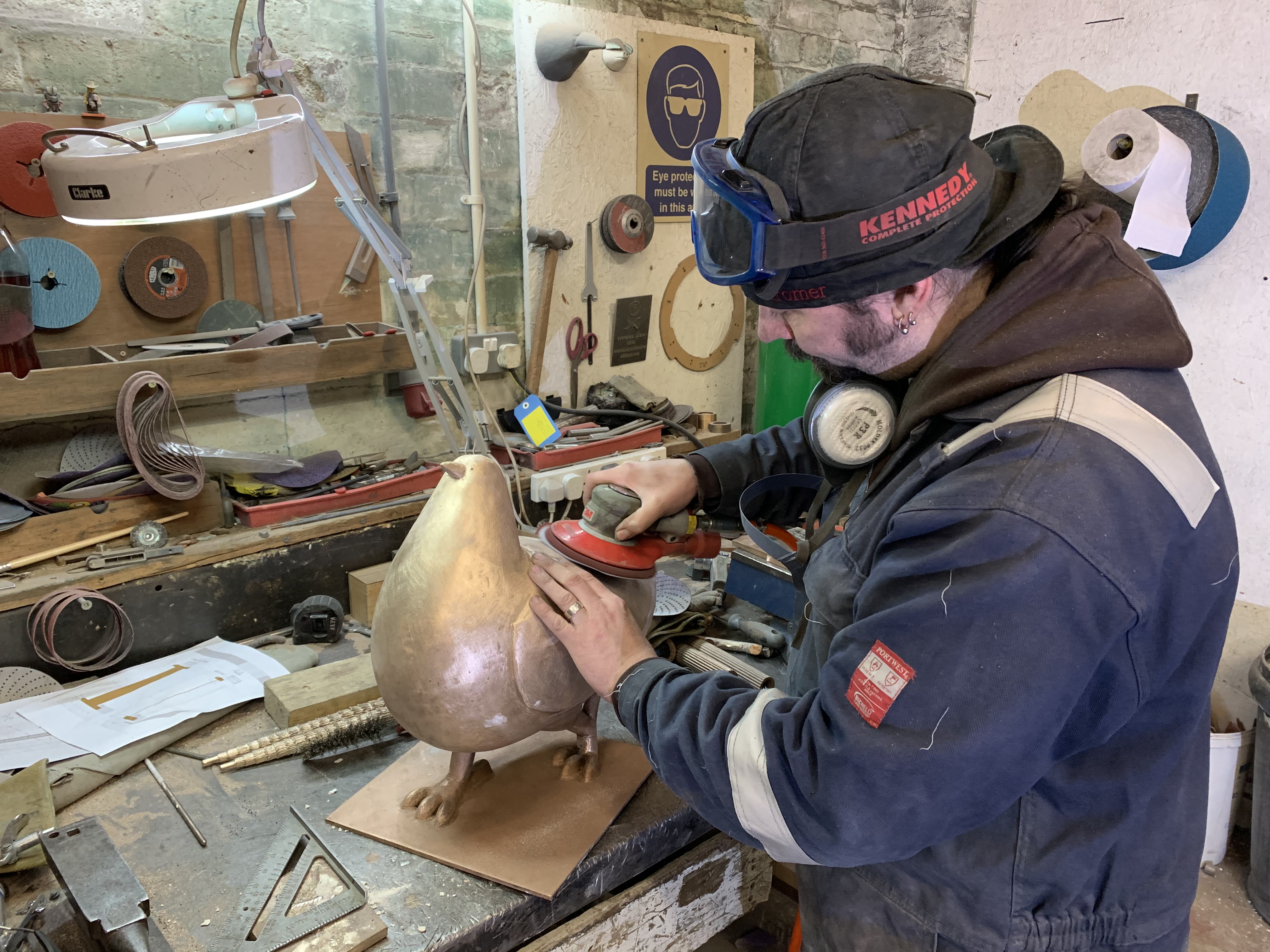 Elm Row pigeons being recast by Powderhall Bronze employee.