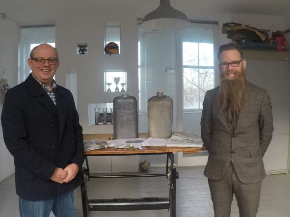 John Lawson, City of Edinburgh Council's Archaeologist and Nicolas Boyes Conservation Consultant with the resealed 1898 capsule and the new capsule stamped with 2022 created by Malcolm Thomson of D.Blake & Co Ltd.  