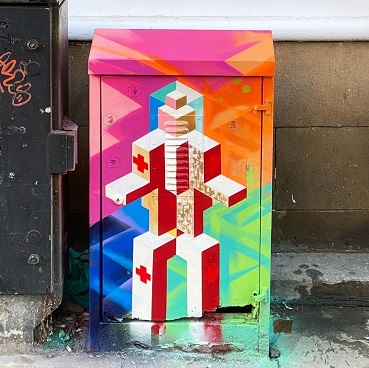 Mural titled Robot Medicine painted on a utility box. 