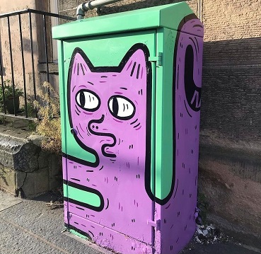 Mural painted on a utility box by KMG titled Witch's Hat. 