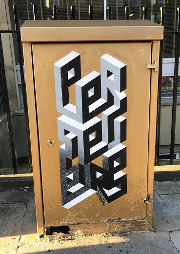 Gold painted utility box on Leith Walk outside Hostelling Scotland.